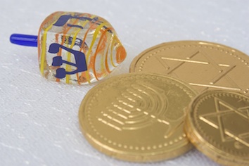 A dreidel and special chocolate coins