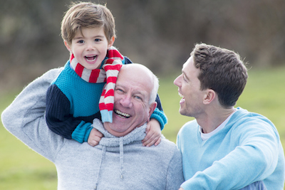 Children celebrate with grandfather also