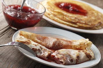 Thin pancakes are called crepes ( say crapes) , which is a French word. They are rolled or folded with a yummy filling inside.