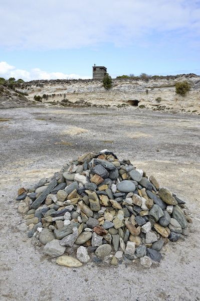 Lime quarry where prisoners broke up big rocks. The 'Remembrance Stones' - a memorial to the courage of the Robben Island political prisoners.The stones are all different colours, all together: a symbol of what they fought for. Photo©iStock
