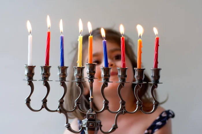 The candles on a special candlestick called the menorah are lit at Hanukkah