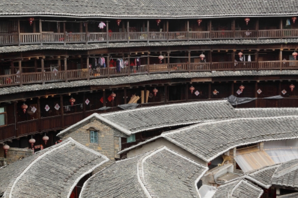 Apartments are built around the inside wall of the tulou. Getty Images