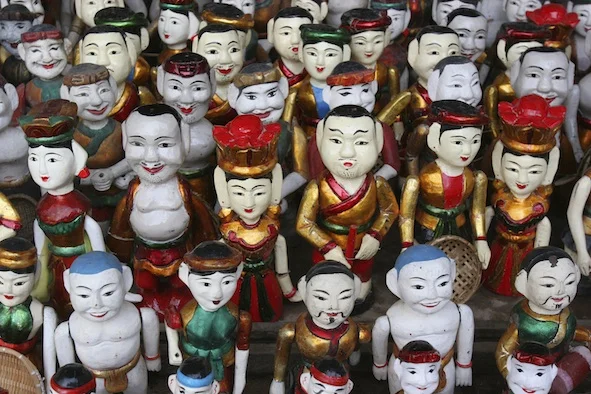 A group of water puppets backstage between performances. ©Getty