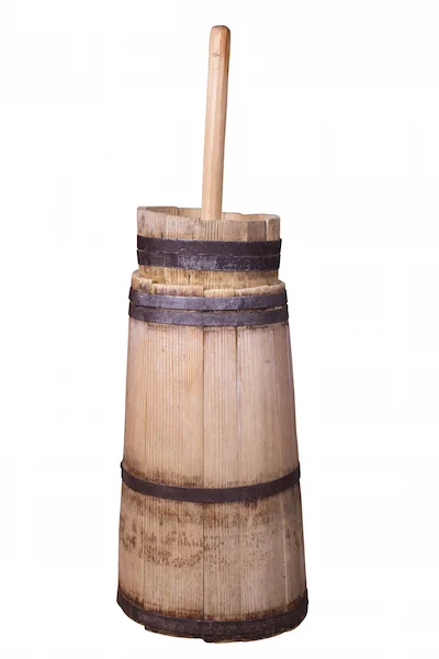 An upright churn: the paddle was moved up and down to agitate the cream. ©Getty