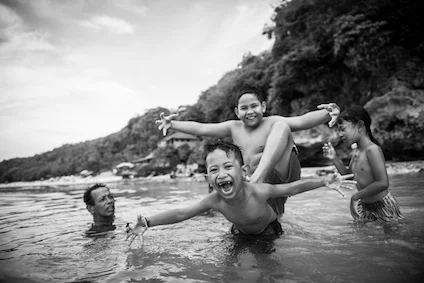 Balinese kids have fun at the beach. There are many fine beaches surrounding Bali ©iStock