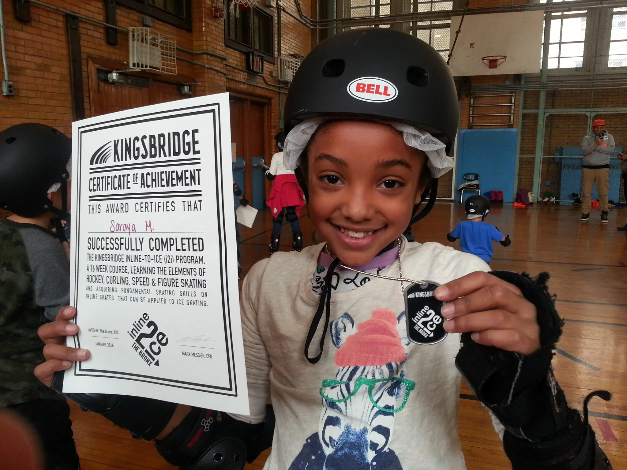 Copy of i2i Girl with Diploma.JPG