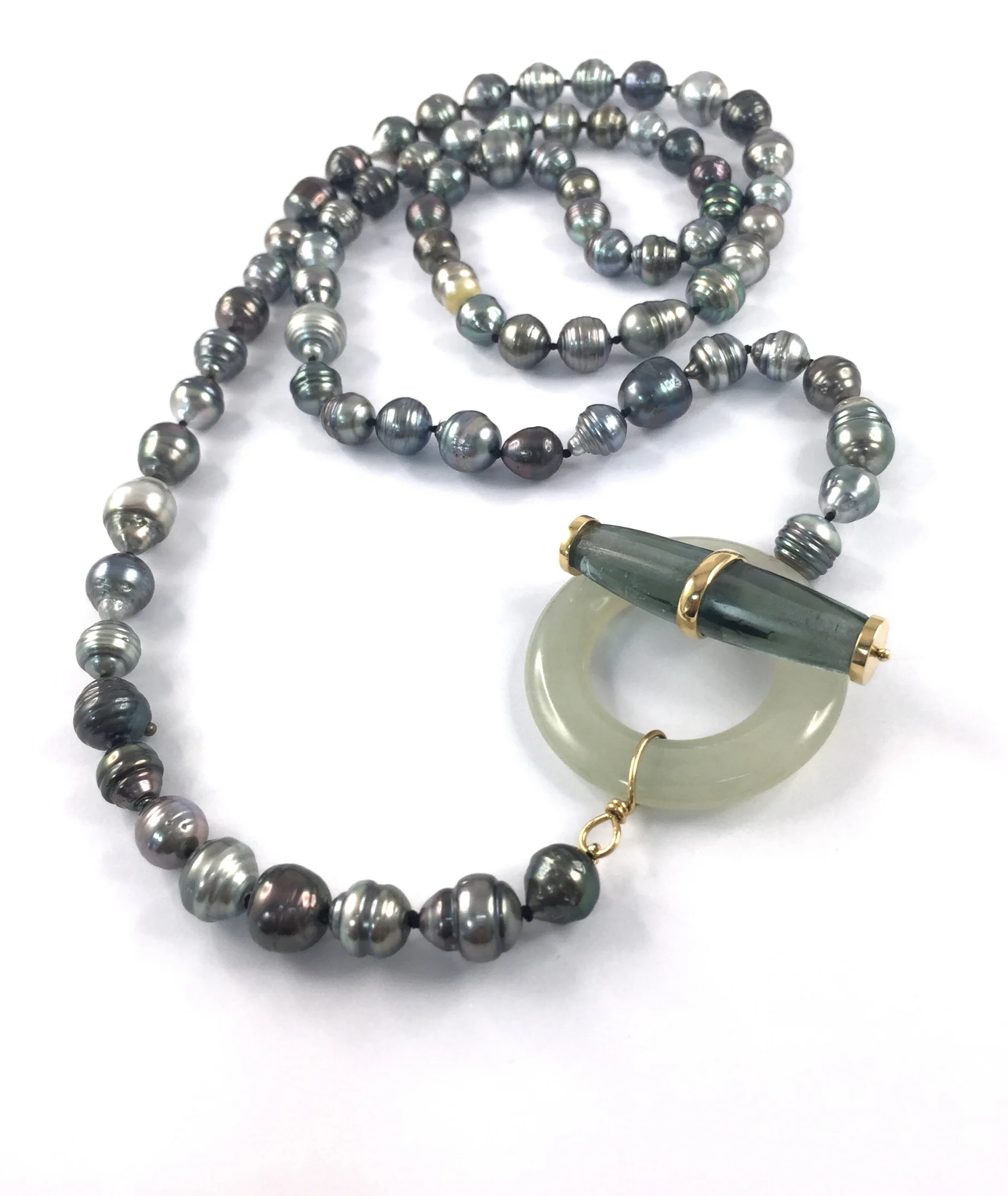 Strand of Tahitian Pearl clasped by antique Glass Trade Bead bar and contemporary jadeite toggle ring