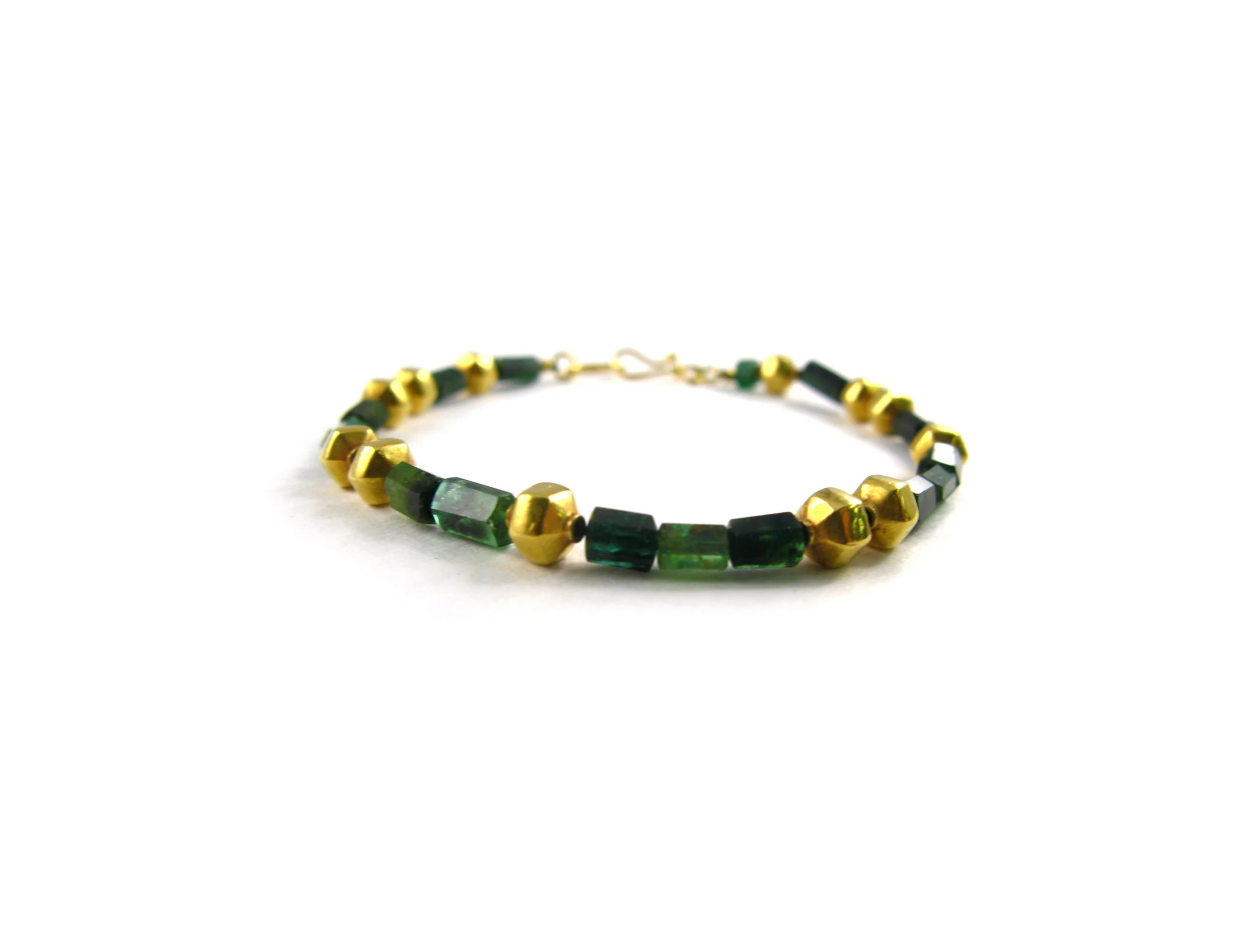 Faceted emerald with gold spacers bracelet