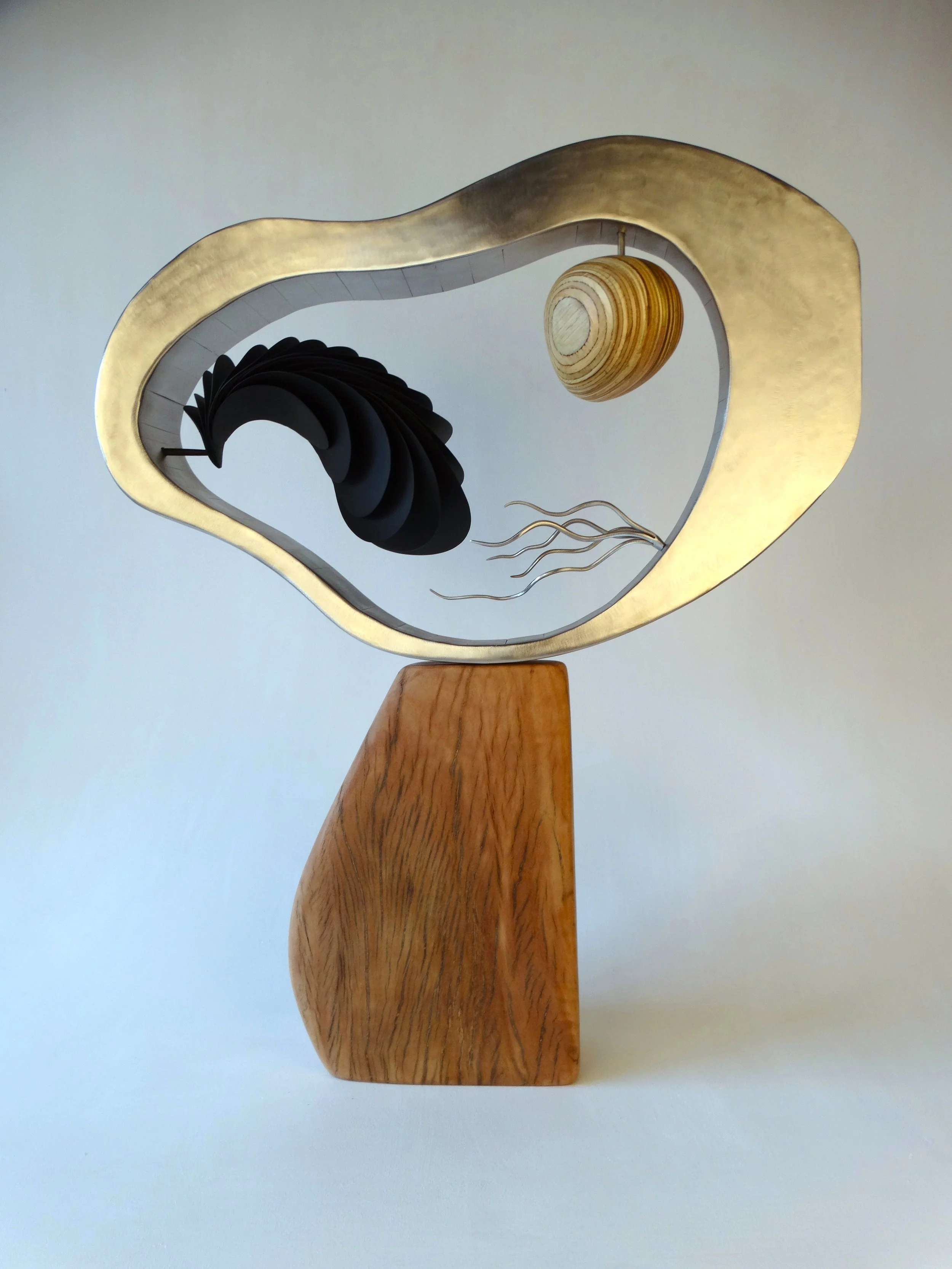 Swim on Air (2026) - stainless steel, yellowbox wood, copper, brass - 73 x 59 x 18cm