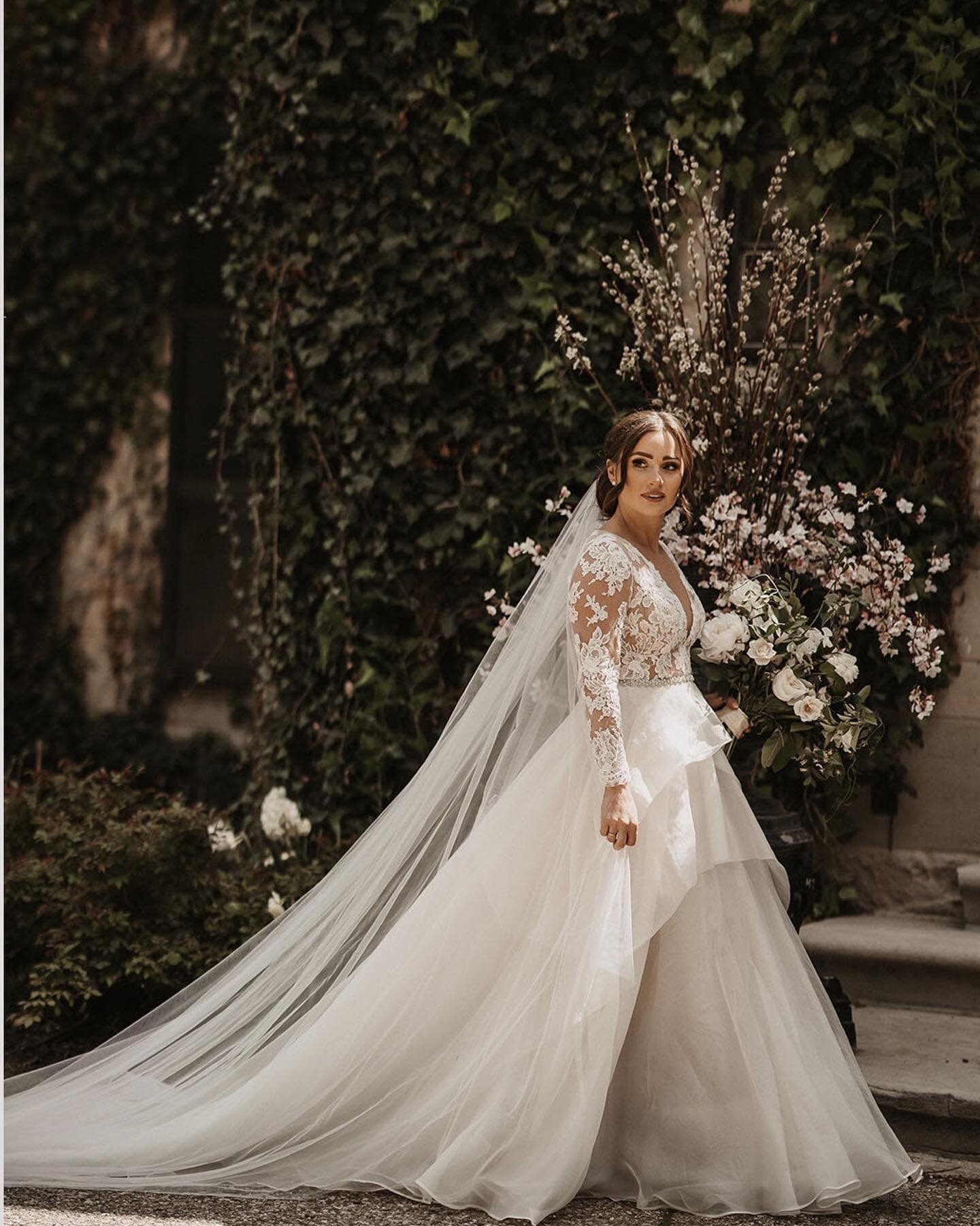 To veil or not to veil?  This shot makes the answer obvious to us!  Our real bride Madison looked gorgeous and classically romantic in her perfectly fitting gown.⁠
⁠
⁠
📷 @gracekalil_photography