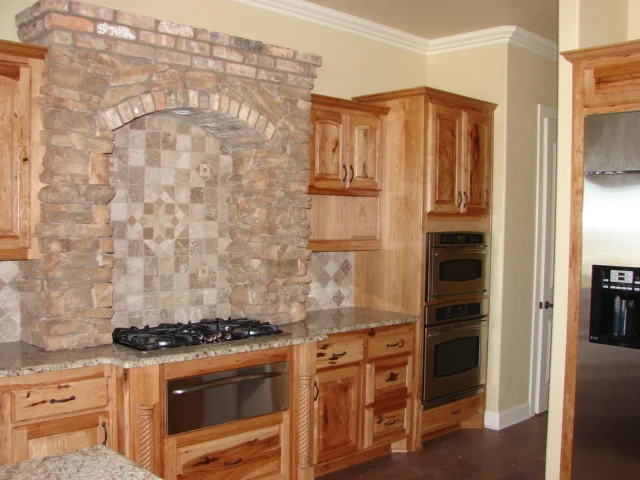  Rustic pecan cabinets with square raised panel doors and a standard 1/2" overlay. 