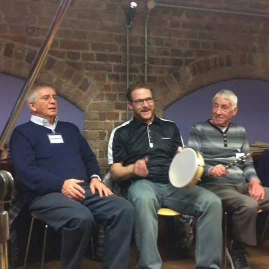 Community Musician, Colin (Centre)
