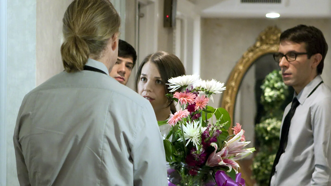 Film Still: L to R: Scott William Winters, Alex Fast, Erin Fritch, Roger Manix