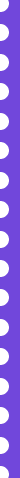 Close-up of a purple object with black jack or pip markings, resembling a playing card or decorative element.