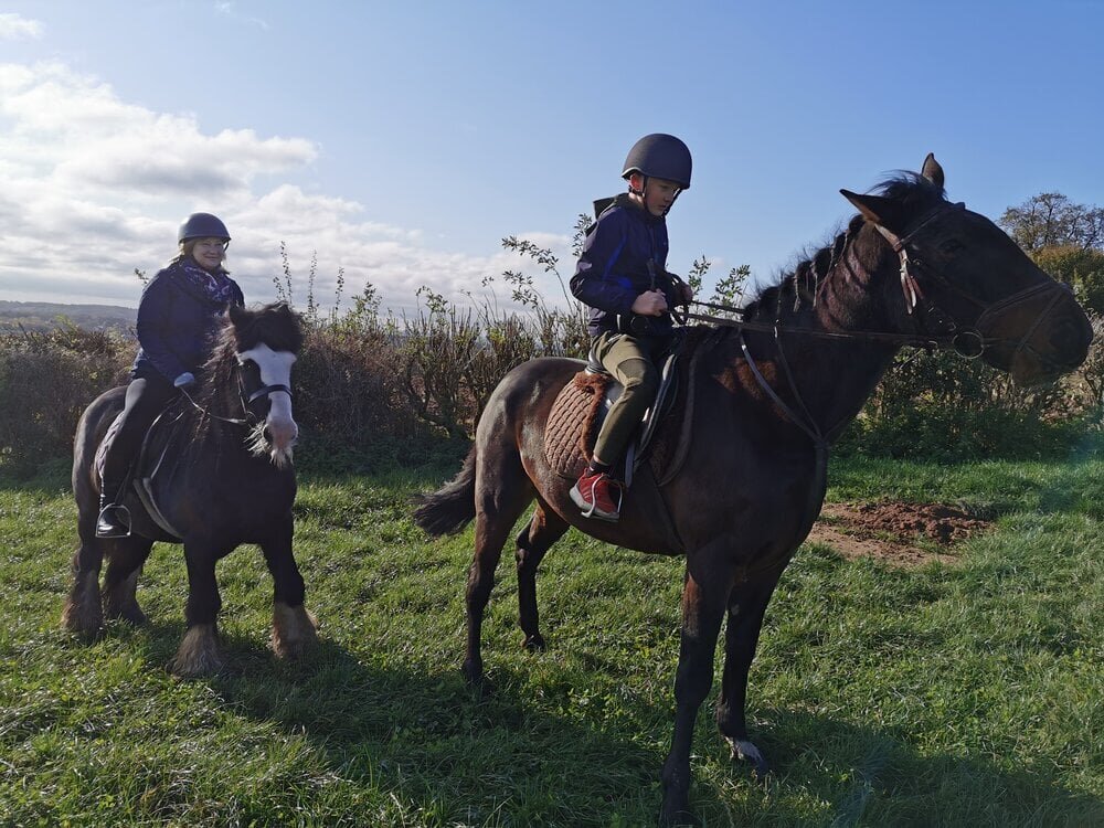 children-riding-horses.jpeg