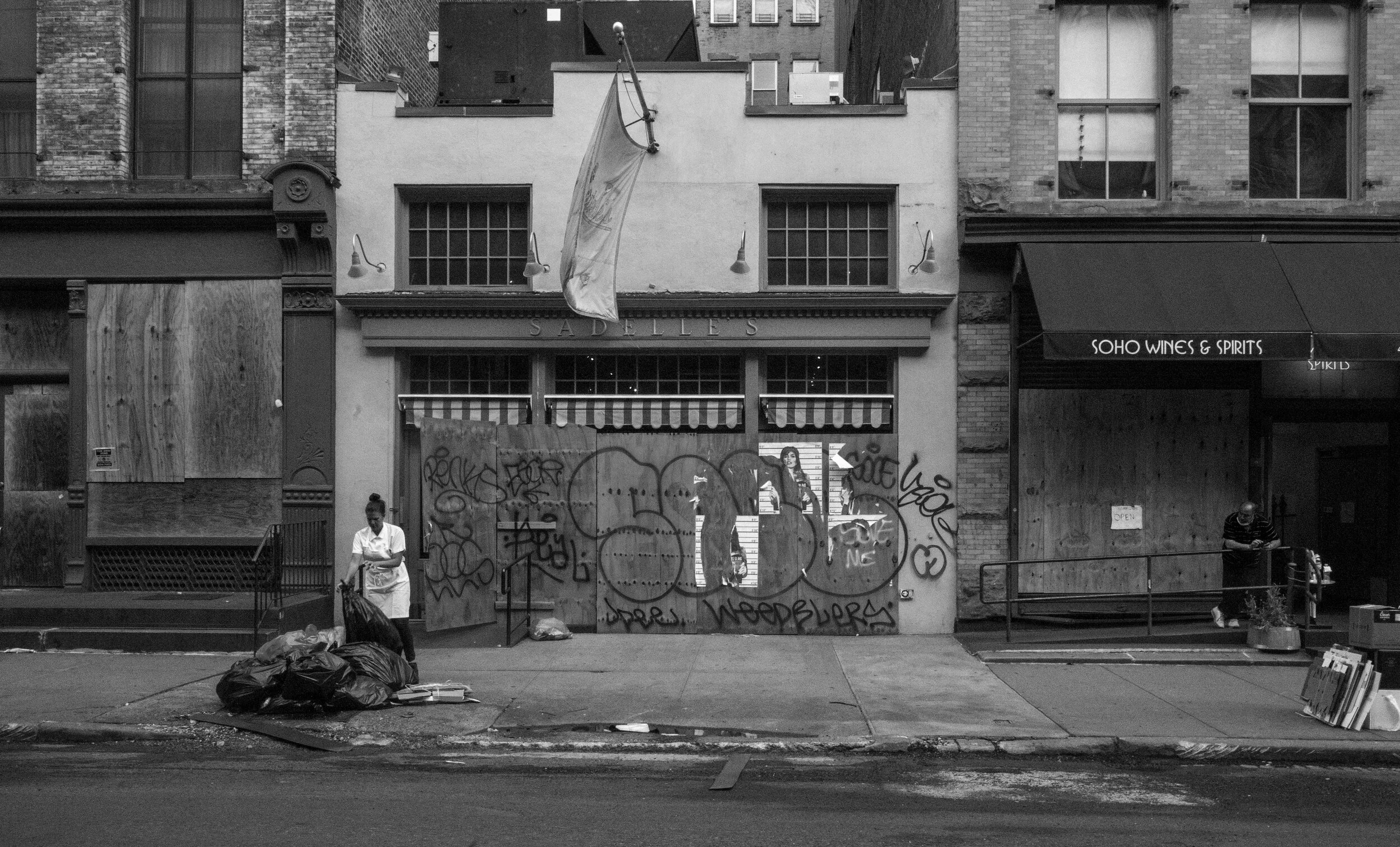 WEST BROADWAY BOARD UP.JPG