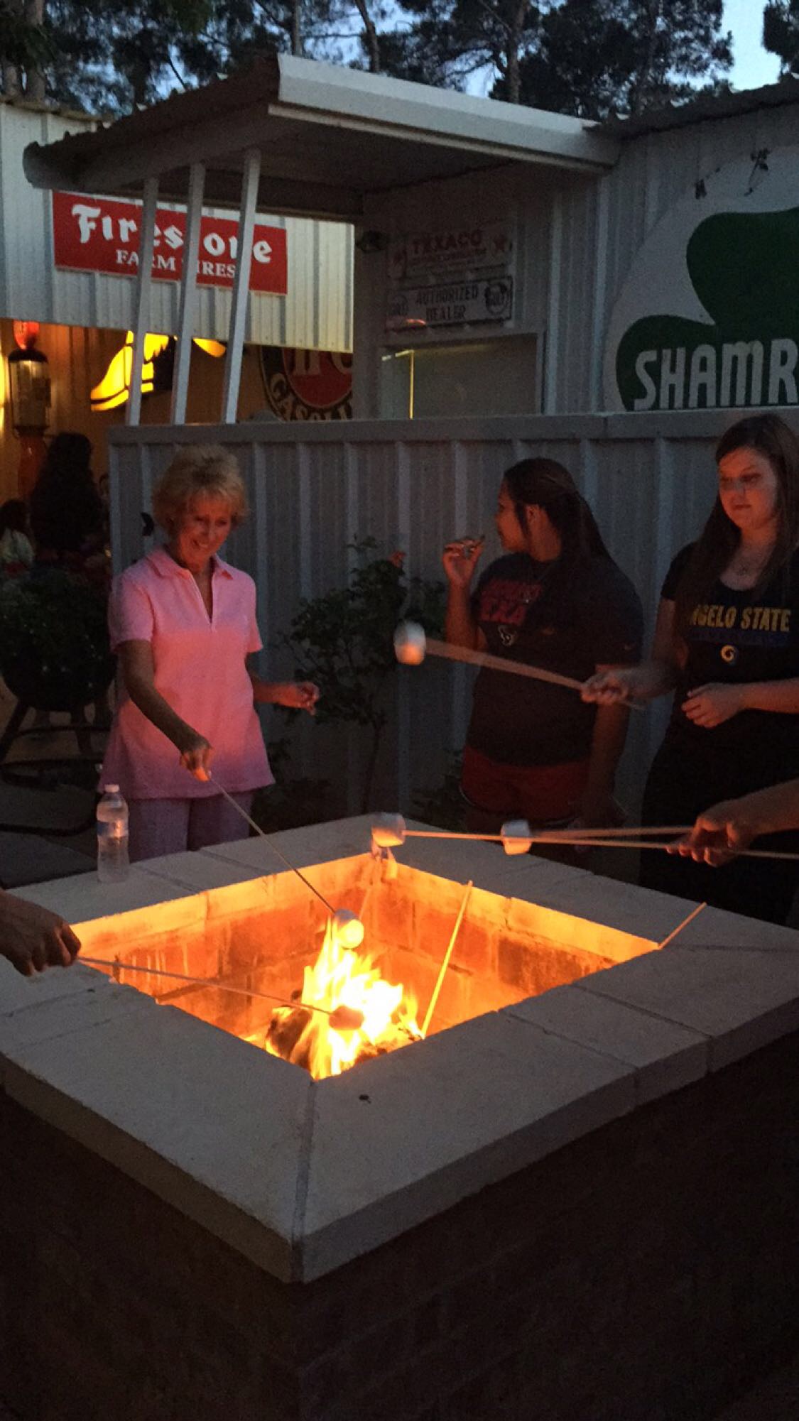 We had hamburgers will all of the fixings, chips, dip, soft drinks, and my favorite part~smore's! We found the large s'more roasting skewers from amazon here and they were perfect!