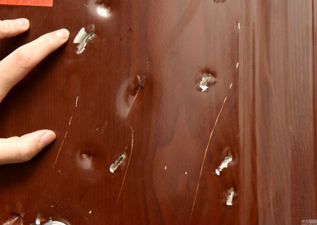 A restaurant operator hunted down a reviewer and damaged his door after the diner posted a bad review online.