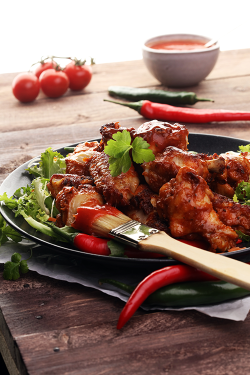 Choose the right amount of buffalo wing sauce to wow your restaurant's guests.