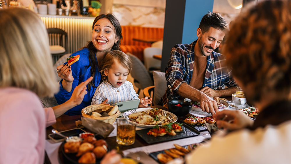 A family enjoys a nice meal at a local restaurant