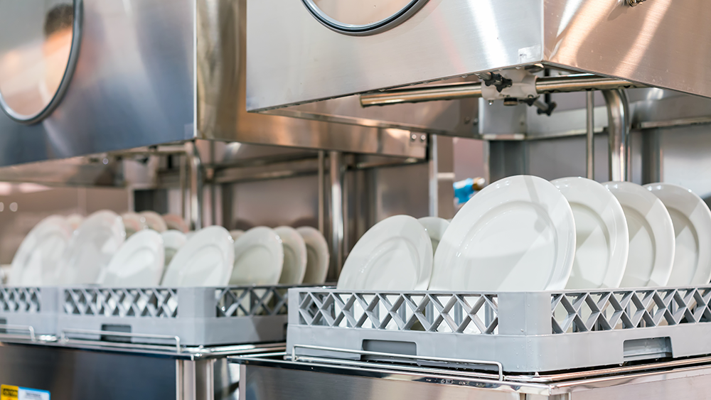 Clean dishes at a restaurant kitchen