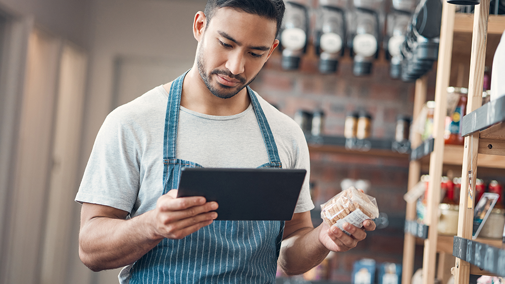 A restaurant manager taking inventory