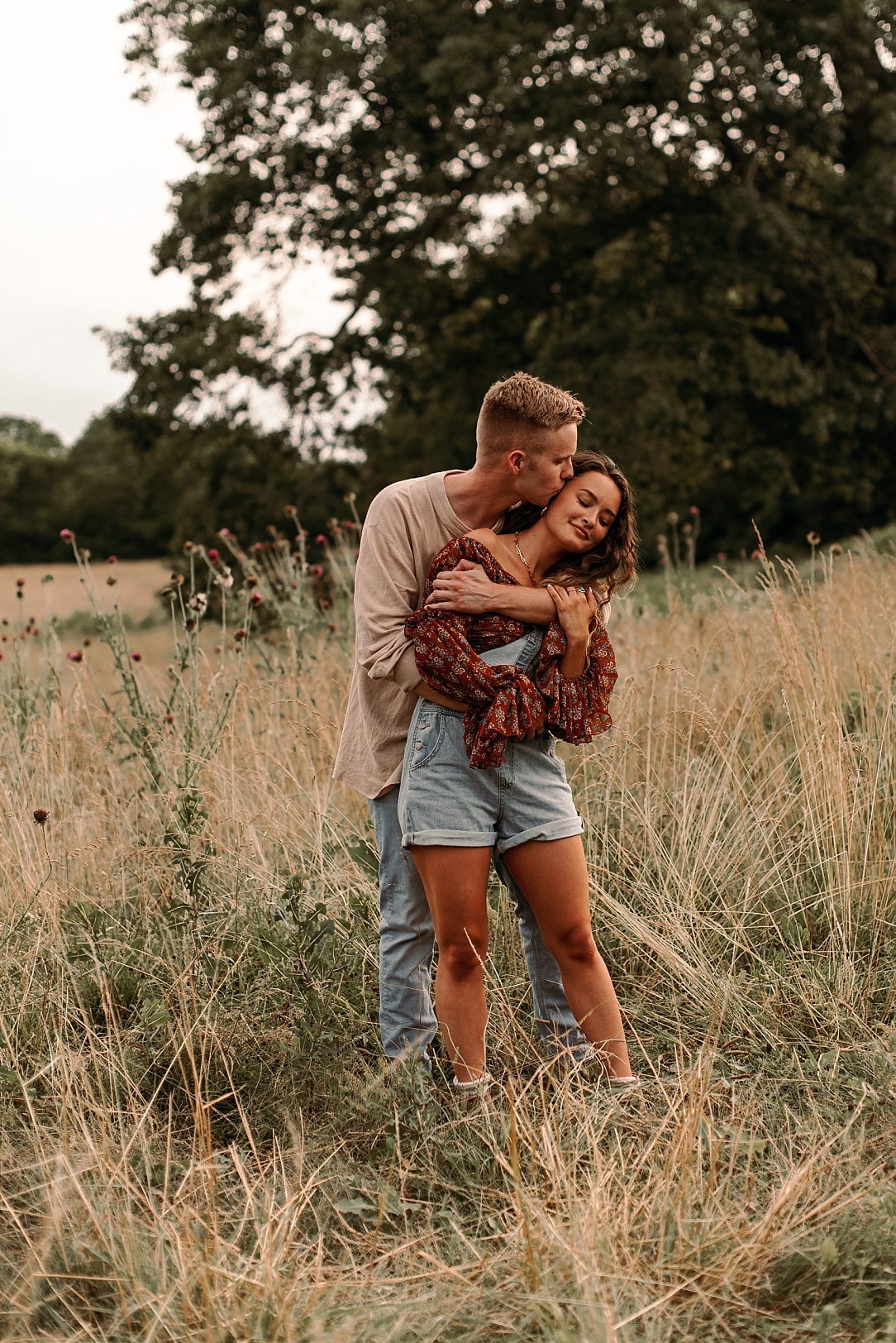 playful summer country field couple session_0013.jpg