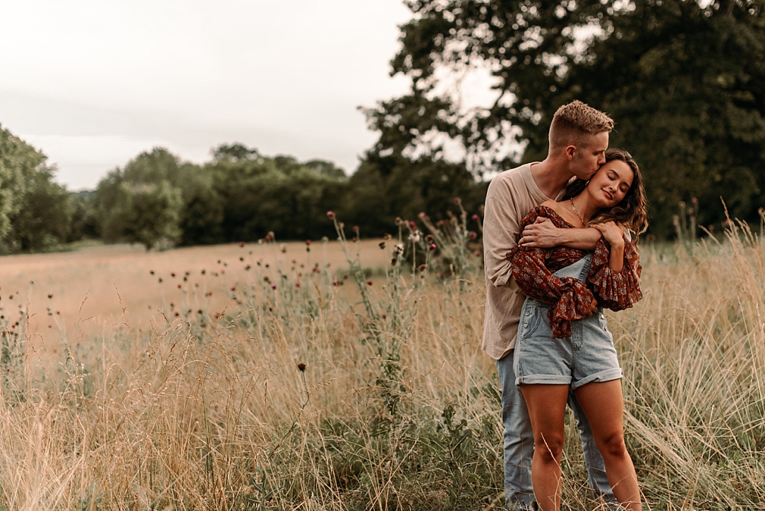 playful summer country field couple session_0014.jpg