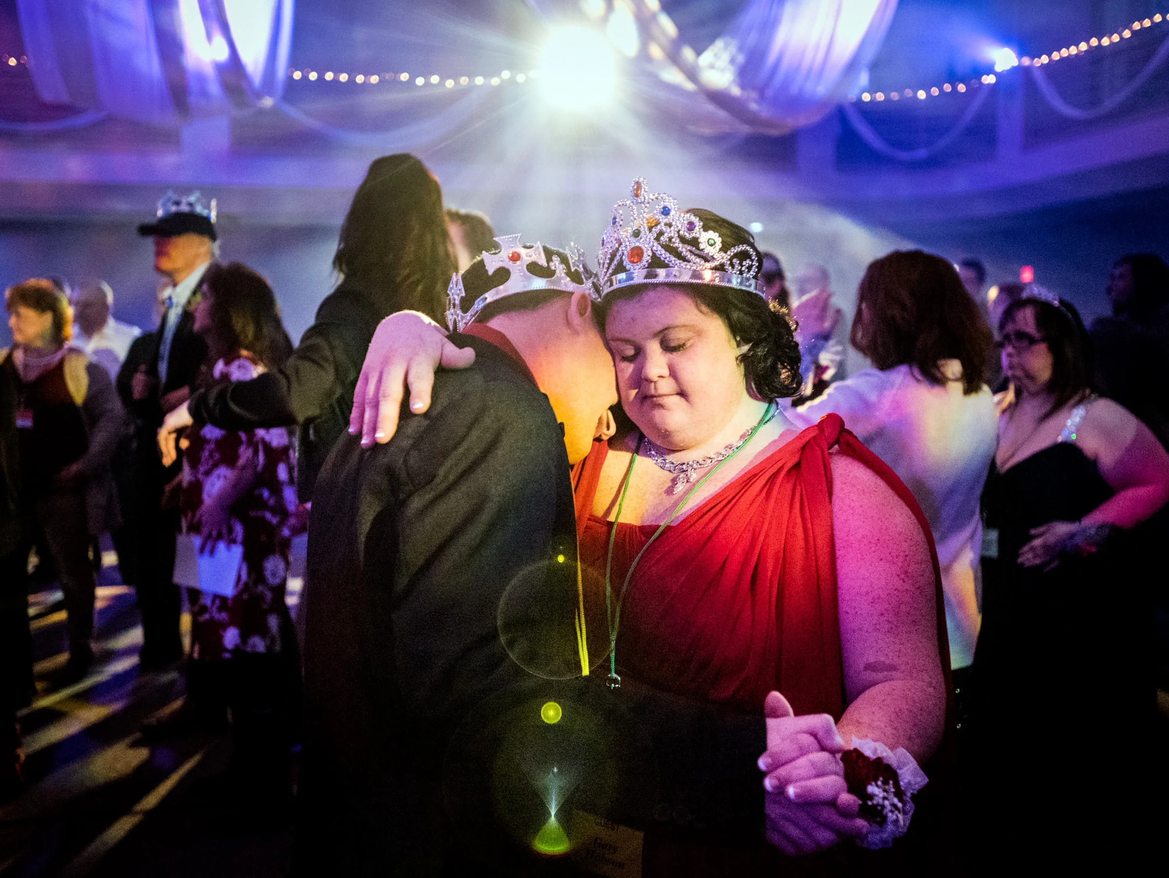  Gary Hobson rests his head upon his girlfriend Carson Swisher's shoulder as they slow dance during the Night to Shine Prom on Friday, Feb. 10, 2017 at First Christian Church Ministries in Kernersville, N.C. The prom is held for the special needs com