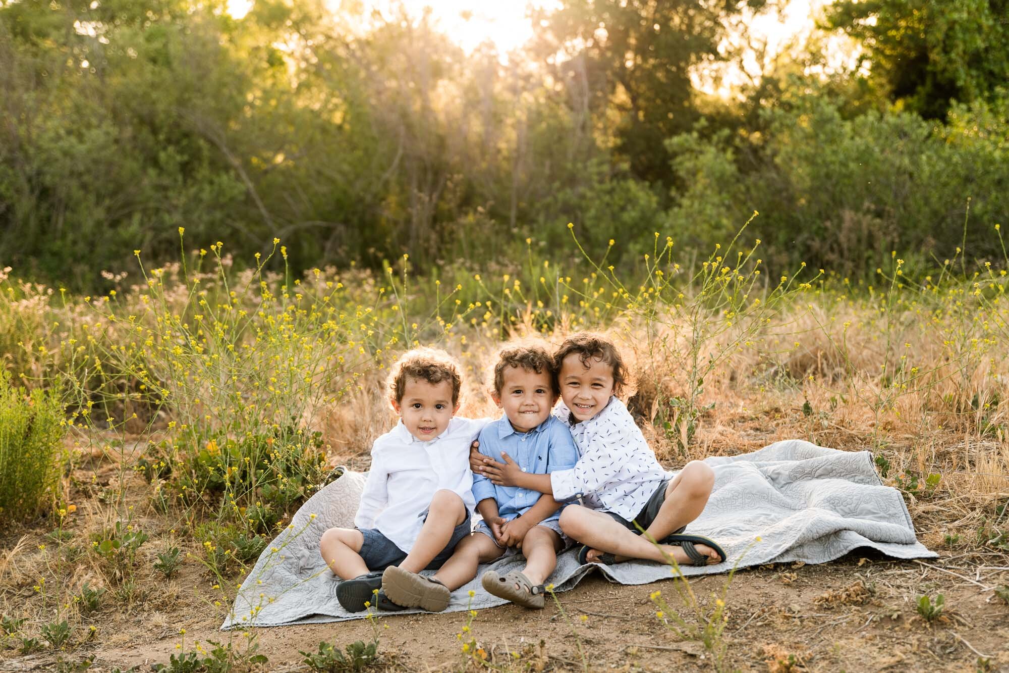 Portrait of three brothers at Sweetwater Bridge, San Diego