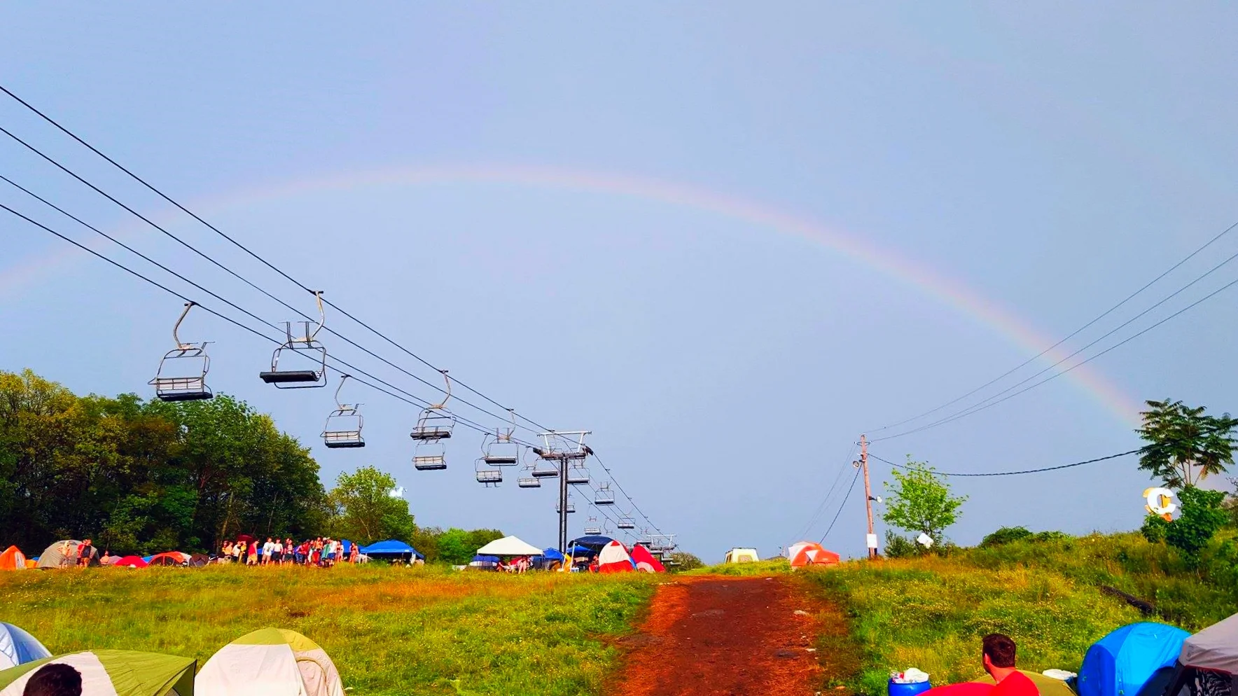 A double rainbow was gifted to the festival after the rainstorm on Saturday moved out as an good omen of things to come.