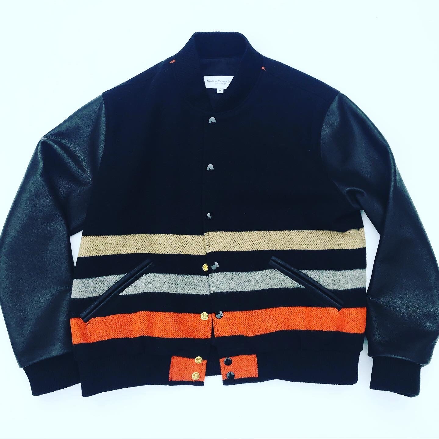  Orange &amp; Black stripe wool, black leather sleeves 