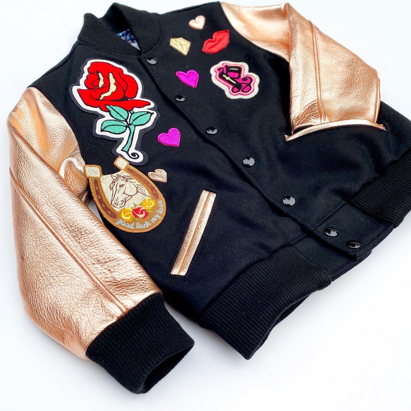  Black wool, rose gold metallic leather, chainstitch patches by Gustavo Martinez 