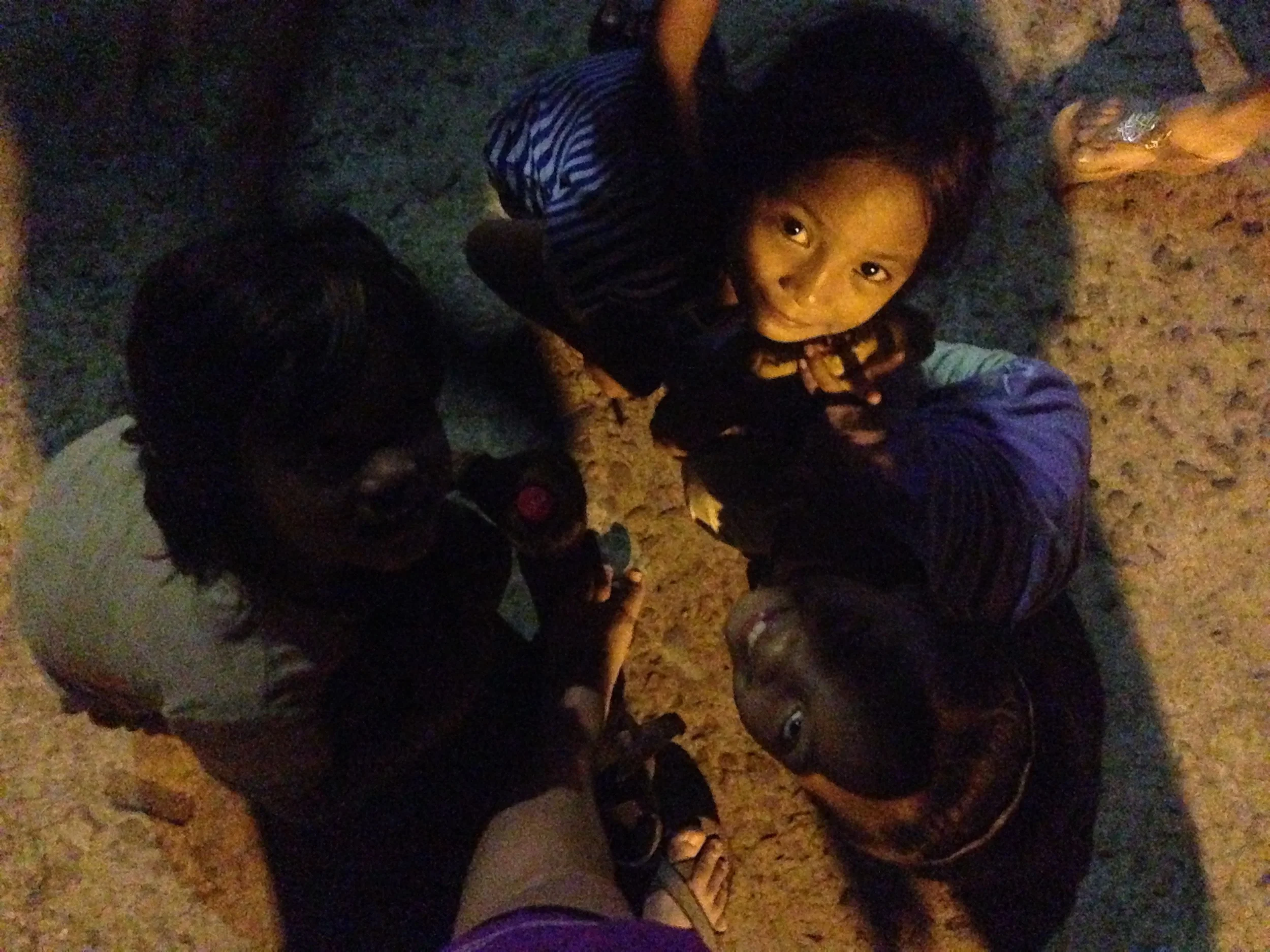 Playing with girls on the street late at night. Parents were not around and were most likely "working."