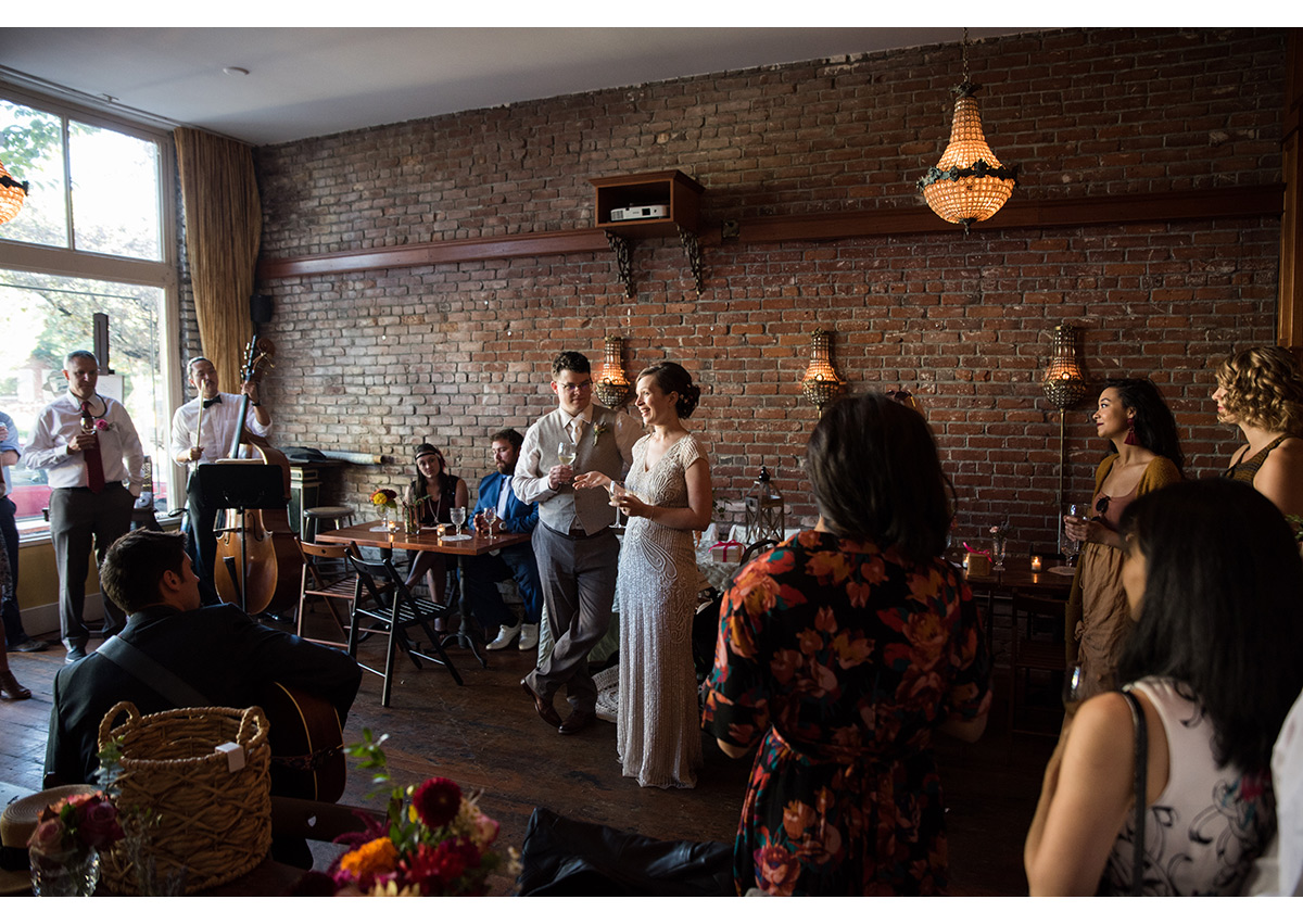 Bride and Groom giving toast at Bad Habit Room
