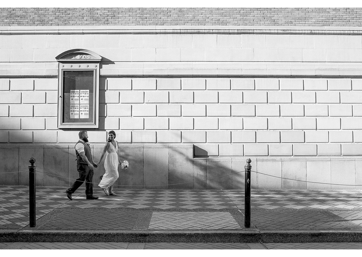 Bride and Groom walking in downtown Portland