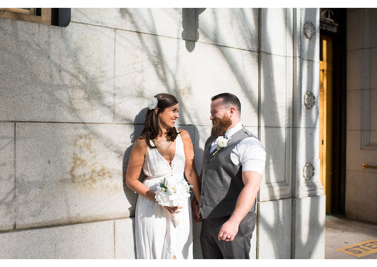 Bride and Groom outside of Multnomah County Courthouse in Portland