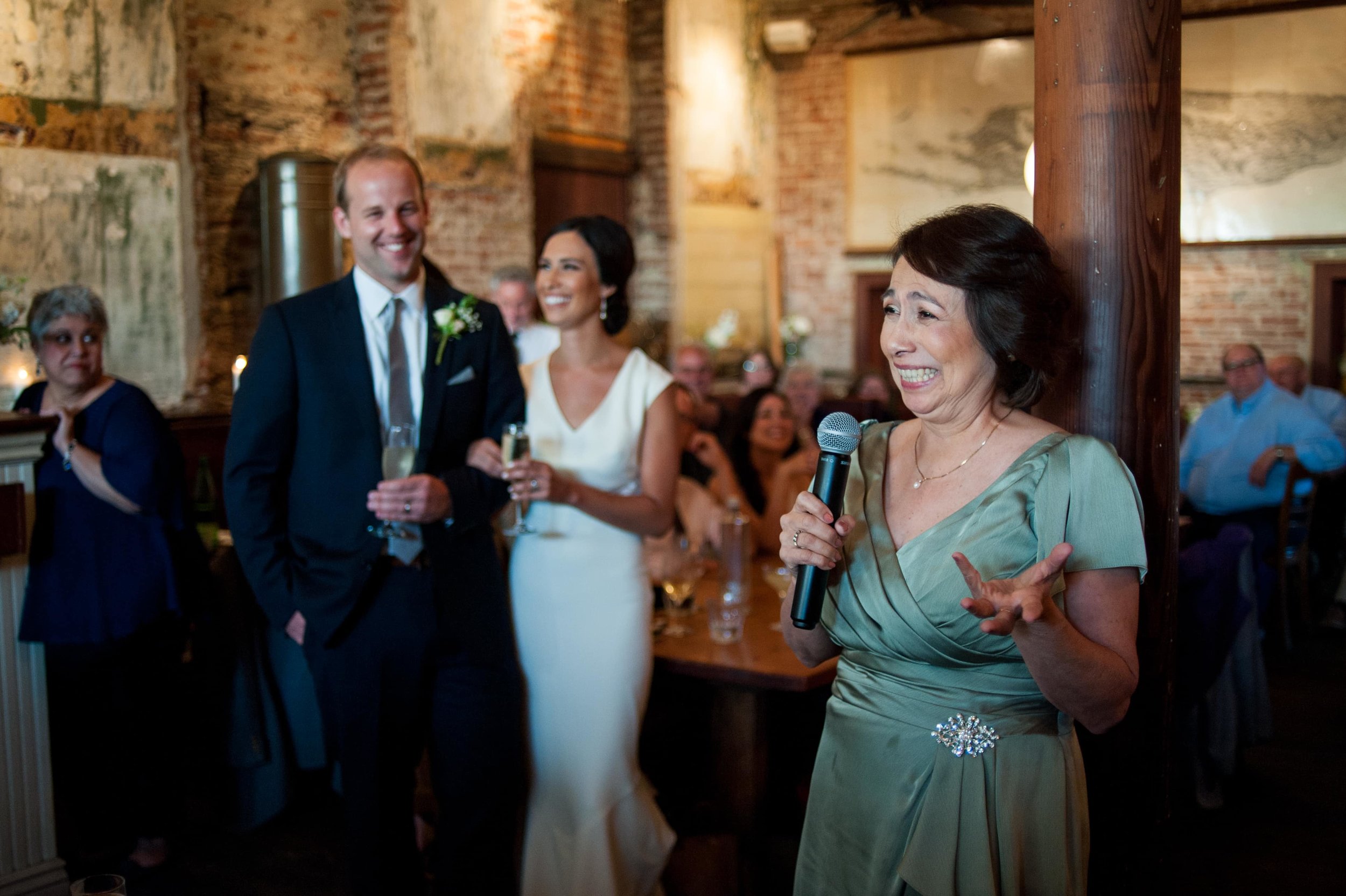 Mother of bride giving toast at Portland restaurant wedding