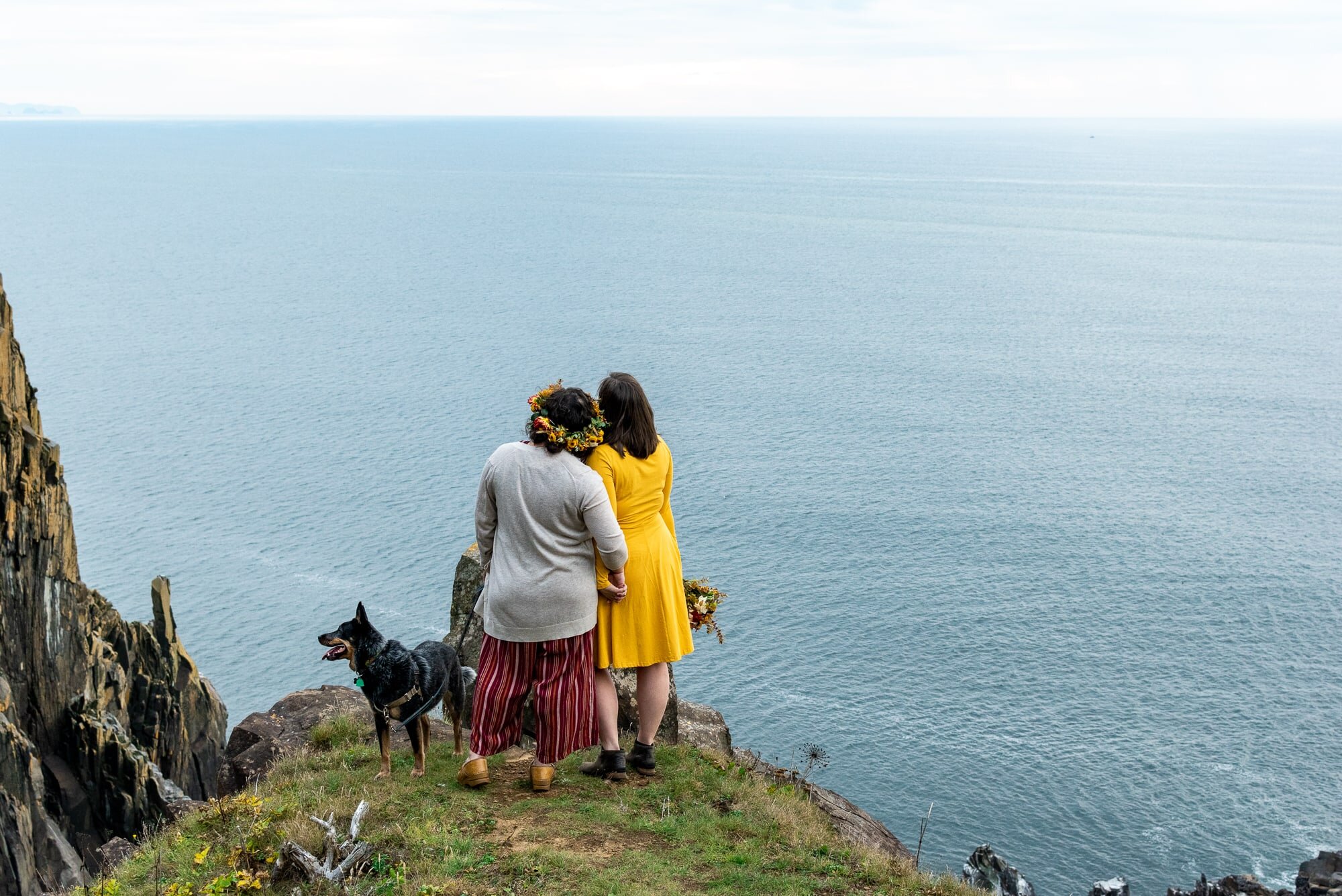 Married couple overlooking ocean on Oregon Coast