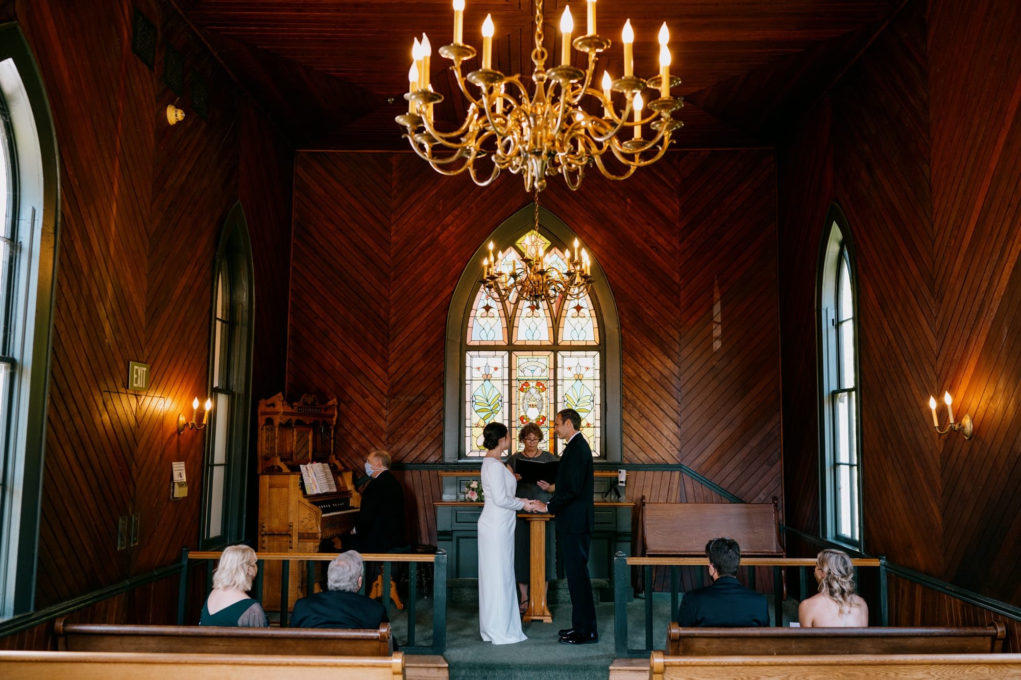 Wide view of ceremony at Oaks Pioneer Church