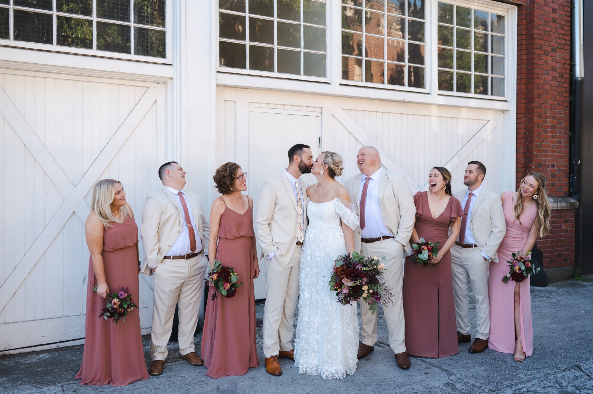 Candid of wedding party on street near The Evergreen