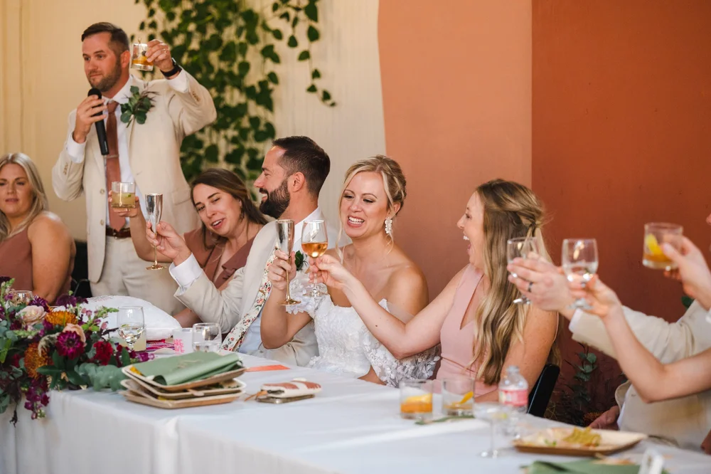 Wedding party giving toast