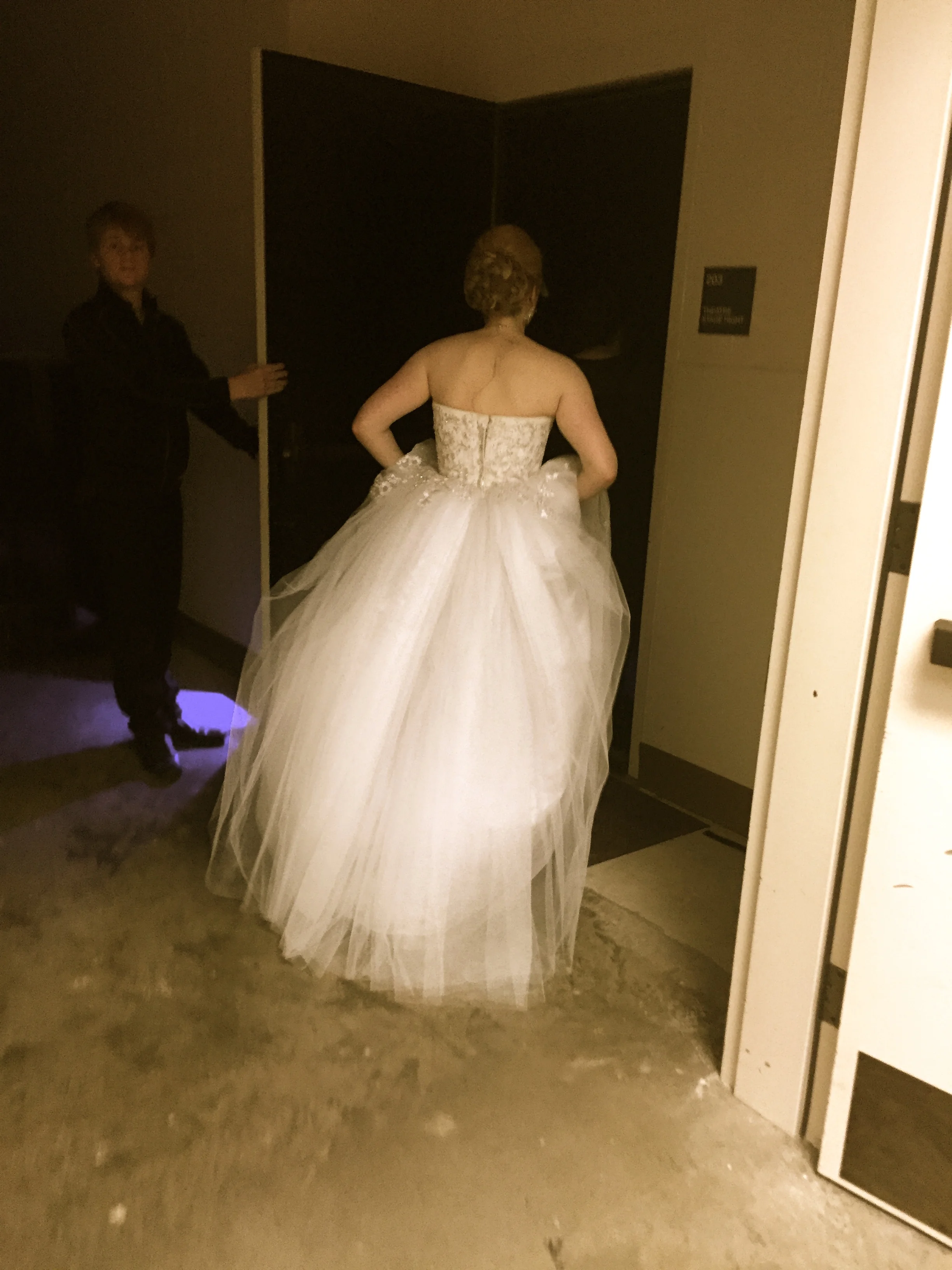 Evita, heading to the Balcony to start Act II