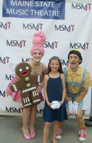 Sugar Plum/Gingy posing with Pinocchio to sign autographs and take pictures with the fans of Shrek Jr . at Maine State Music Theatre