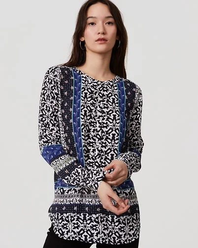 A patterned blouse can work as well, but should be toned down by the other clothing you choose to wear. In other words, don't go totally bold with all of your pieces. A patterned blouse can suggest a fun outgoing personality.