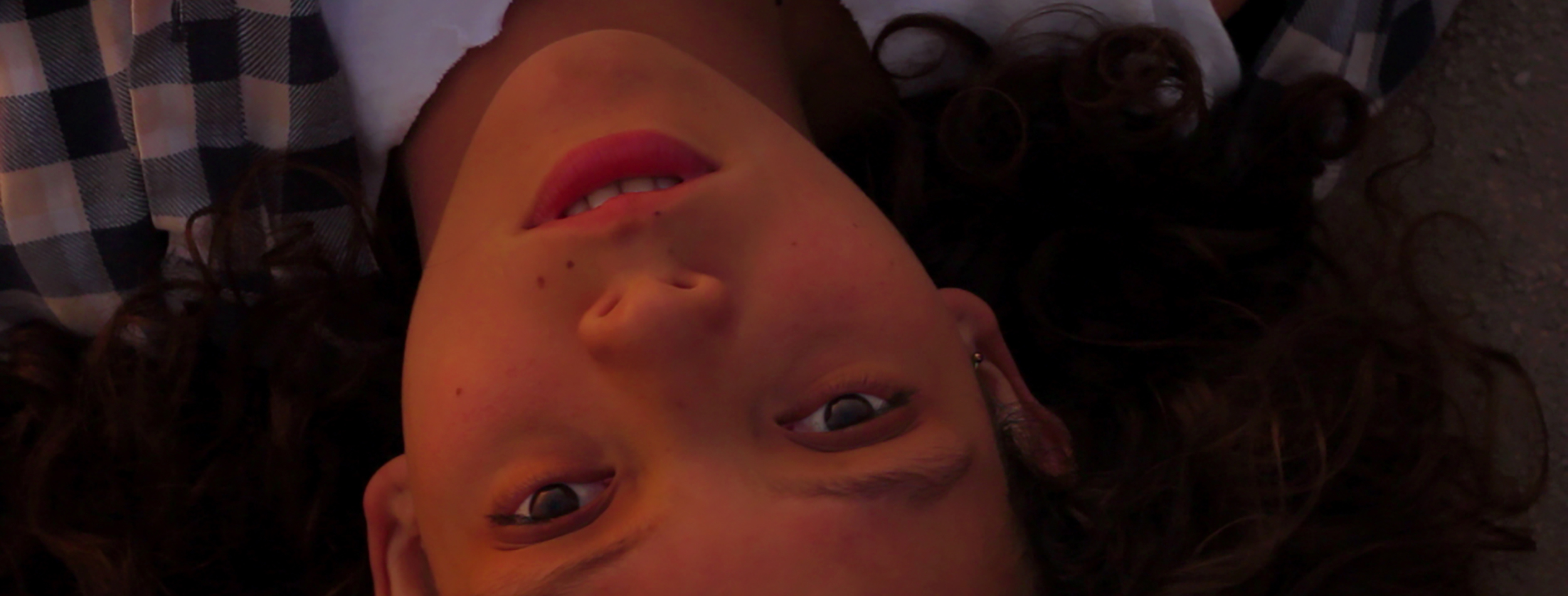 VIDEOPHILIA (AND OTHER VIRAL SYNDROMES) / VIDEOFILIA (Y OTROS SÍNDROMES VIRALES) (Juan Daniel F. Molero, Peru/USA, 2015, color, 102 min. In Spanish with English subtitles. U.S. Premiere) Nominated – Best First Film The first Peruvian film to ever win the Tiger Award at the Rotterdam Film Festival , Videophilia (and Other Viral Syndromes) follows Luz, a teenage misfit from Lima who meets online Junior, a weird slacker who is obsessed with conspiracy theories, Mayan prophecies of the end of the world, and underground porn. They try to hook up in the real life but supernatural events start to unfold to guide their destinies. Set in Lima, Juan Daniel F. Molero’s exhilarating debut fiction film is a playful mashup of internet cafes, slackers, not-so-innocent schoolgirls, amateur porn, Google Glass, acid trips and guinea pigs as extras in an exorcism. Saturday, February 27, 7pm