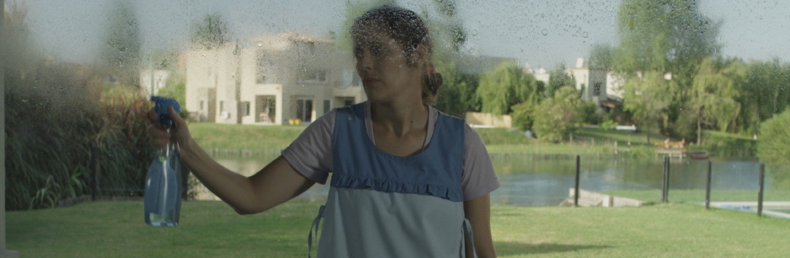 A DECENT WOMAN / LOS DECENTES (Lukas Rinner, Argentina/ Austria/South Korea, 2016, 100 min. In Spanish with English subtitles. U.S. Premiere) Closing Night, Q&A with Lukas Rinner Buy Tickets Lukas Rinner 2016 /Argentina Spanish with English subtitles 100 minutes In this exquisitely staged deadpan comedy in the vein of Jacques Tatí’s Mon oncle , a maid sent to work inside a gated community slowly becomes radicalized by a nudist resort next door. Belén, the wide-eyed and placid domestic, obediently tends to Diana, an overbearing socialite, and her sporty, temperamental adult son (hilariously referred to throughout only as “Juanchí”), and sparks a romance with a kind security guard. However, her curiosity leads her to visit the nudists, and she wholeheartedly embraces new understandings of sexuality and society. When the McMansion dwellers conspire to shut down their colony, violence erupts. Tuesday, January 31, 7:30pm