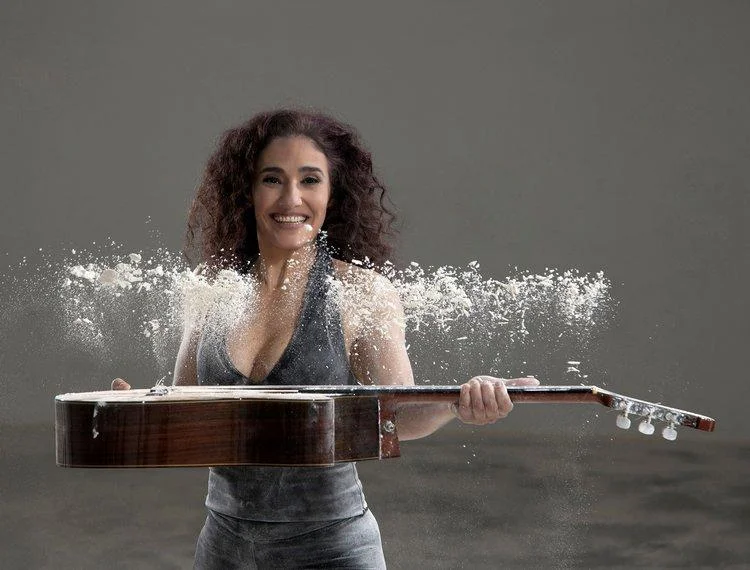 BADI (Edu Felistoque, Brazil, 2017, 85 min. In Portuguese with English subtitles) Directed by Edu Felistoque, Badi observes the personal trajectory and career of the singer, guitarist, and composer Badi Assad. From classical to pop, the film follows Badi and her guitar as they move through the hyper-masculine musical universe - persistently reinventing herself and confronting challenges, including the pressure of belonging to a family of virtuoso musicians, with lightness. This gentle and strong woman, with her own creative process and enormous talent, is not afraid to take risks and charm the world without losing sight of who she is: a simple girl from the interior of São Paulo who values not strident success but the simple emotionality of art and life. The documentary features guest appearances by the Assad brothers, Larry Coryell, Toquinho, Naná Vasconcelos, Seu Jorge, and other great names of Brazilian and International music. Badi will perform with at Guild Hall on Saturday, July 7 at 8pm. Click here for more information and to purchase tickets. Wednesday, July 6, 4pm Guild Hall 158 Main Street, East Hampton, NY 11937 (631) 324 0806 / www.guildhall.org Music + Film: Brazil is programmed by Mary Jane Marcasiano. Sponsored by the Consulate General of Brazil in New York with additional sponsorship from Brazilian Music Foundation, and Hélio Campos.