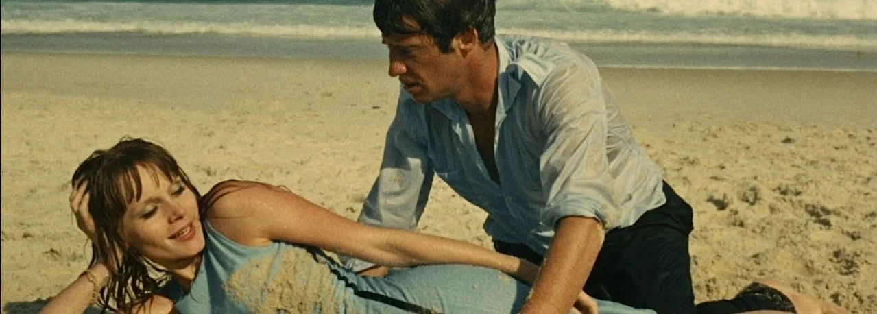 THAT MAN FROM RIO ( L'homme de Ri o, Philippe de Broca, France/Italy, 1964, 112 min. In French, Portuguese, and English with English subtitles) A blow dart-wielding thug snatches a rare statuette from the Musée de l’Homme; anthropologist Jean Servais (Rififi) is kidnapped in broad Parisian daylight; serviceman Jean-Paul Belmondo begins his 8-day leave by changing to civvies in a Métro entrance and witnesses fiancée Françoise Dorléac (Catherine Deneuve’s sister, killed in a car accident 3 years later) getting kidnapped herself–and then the chase begins: by motorcycle, shoe leather, flight to Rio de Janeiro sans ticket or passport, airport baggage carrier, cable car, pink car complete with green stars and a rumble seat, water skies, Amazon river boat, seaplane, jungle vine… all shot in breathtaking widescreen and color. Even as Dorléac, rescued, is kidnapped again, Belmondo performs his own blood-curdling stunts against that sugar loaf Rio skyline and across that under-construction unearthly architecture of Brasilia (even parachuting almost into the jaws of a hungry croc). Saturday, July 20, 2pm