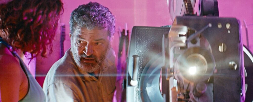 DOMINICAN REPUBLIC: The Projectionist / El proyeccionista A film by José María Cabral Young and prolific filmmaker José María Cabral will represent the Caribbean island at the Oscars for the third time (after Jacque Mate in 2012 and Woodpeckers in 2017. Cabral’s seventh feature film had its world premiere at the last edition of the Miami Film Festival. In The Projectionist , Eliseo is confined to live his existence infatuated with a woman who is present only through a projected film reel. On an eventful night, the reels are damaged and Eliseo is left completely devoid of any connection with his beloved projection. In this new existence, he is plunged into a search for the real identity of the woman he so passionately and lustfully loved for so many years but in order to accomplish this journey he must appeal to all he knows, project movies, in the most remote and poorest areas in the Dominican Republic, accompanied by a free-spirited girl that will show him that blood is thicker than water in more ways than one.